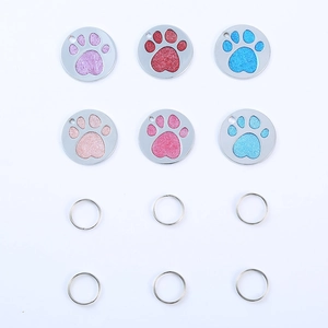 Set of 6 colorful glitter paw print pet ID tags with stainless steel rings for collars