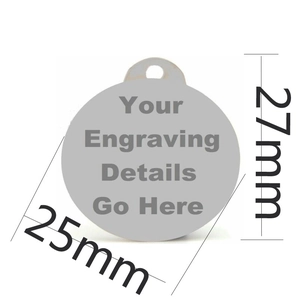 Macro detail of custom 25mm round stainless steel pet tag showing engraving surface area