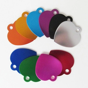Colorful heart-shaped aluminum dog tags in ten various matte finishes for pet collars