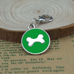 Round green enamel pet tag with silver bone design and durable metal lobster clasp