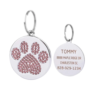 Customized paw print pet ID tag with pink rhinestones and laser engraved contact info