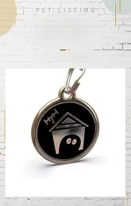 Detail showing round zinc alloy pet tag with house design and enamel finish for dog collars