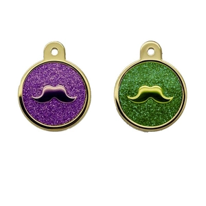 Golden round pet ID tags with purple and green glitter background and mustache charms