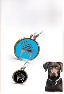 Detail of round zinc alloy pet ID tags featuring house patterns and dog collar hooks