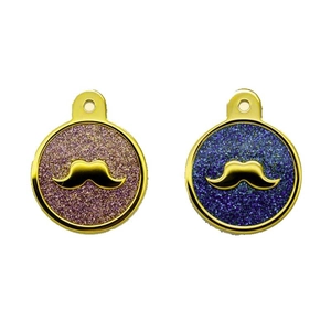 Golden round pet ID tag with mustache design and colorful glitter inlay on white background