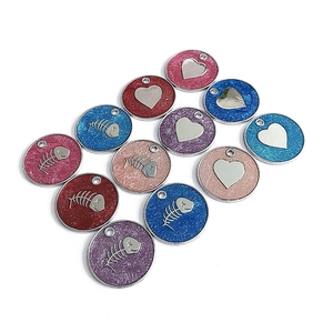 Colorful glitter pet ID tags with heart and fishbone charms for cats and dogs