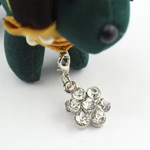 Detail of silver plum blossom pet charm with sparkling crystals and lobster clasp