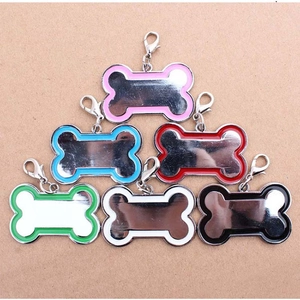 Customizable bone-shaped pet ID tags in six colors with polished finish and lobster clasp