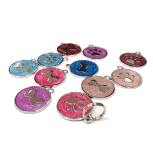 Colorful paw and bone shaped metal pet tags for dogs and cats with glitter finish