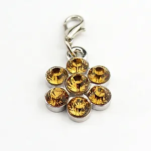 Sparkling plum blossom pendant with champagne crystals and silver-tone lobster clasp