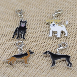Set of 4 enamel dog breed charms including Jack Russell and Shepherd with lobster clasps