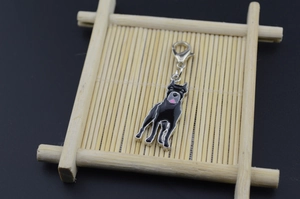 Detailed close-up of a Great Dane enamel pet charm with a silver lobster clasp