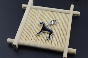 Detailed view of Great Dane dog charm with black enamel finish and lobster clasp