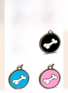 Custom round pet tags in red black blue and pink with bone icon and metal frame