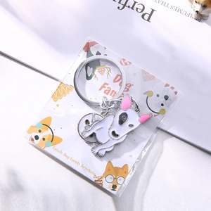 Bull Terrier enamel keychain with silver ring on a Dog Family backing card