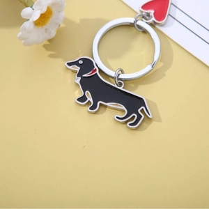 Dachshund metal keychain with black enamel dog charm and red heart pendant