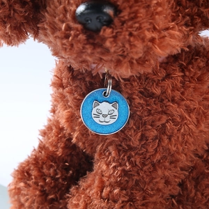 Blue enamel cat tag pendant with white cartoon face on pet collar and metal ring