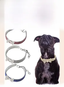 Detail view of rhinestone pet collar with bow knot and adjustable lobster clasp for small dogs