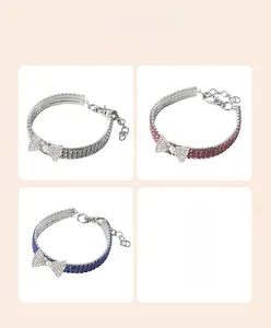 Selection of pet collars featuring sparkling rhinestones and elegant bowknot pendants