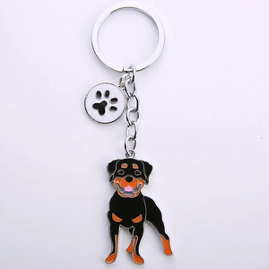Rottweiler dog metal keychain with colorful enamel charm and black paw print pendant