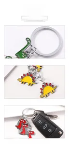 Detailed view of colorful cartoon dinosaur metal keychains with durable split rings