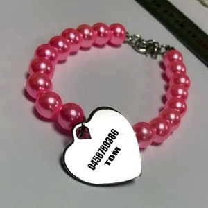 Pink beaded pet collar necklace with customizable silver heart identity tag and metal clasp