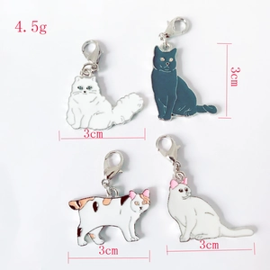 Detailed view of four enamel cat charms featuring size and weight specifications