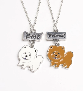 Détail de colliers Best Friend avec pendentifs chien chow-chow blanc et marron en émail