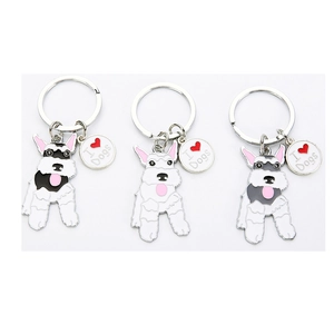 Three-piece set of Schnauzer dog metal keychains with white enamel and colorful details