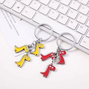 Détails des porte-clés dinosaures mignons en rouge et jaune avec finition en émail