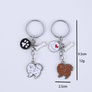 Creative Pomeranian metal keychain set with heart charms and bone pendants for dog lovers