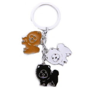 Cute metal keychain featuring brown white and black Chow Chow dog enamel pendants