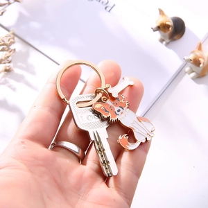 Creative metal pet dog keychain with border collie pendant and bone charm accessory