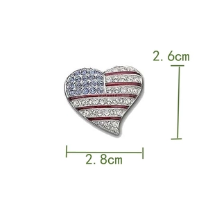 Macro shot of heart-shaped USA flag brooch showing 2.8cm width and diamond details