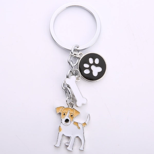 Detail of Jack Russell Terrier keychain with bone and paw print charms on silver ring