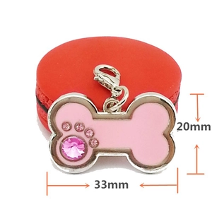 Pink bone-shaped pet ID tag with sparkling rhinestone paw print and durable lobster clasp