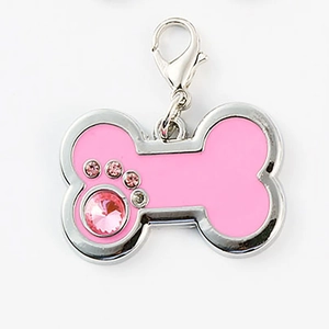 Pink bone-shaped pet pendant with rhinestone paw print and silver lobster clasp