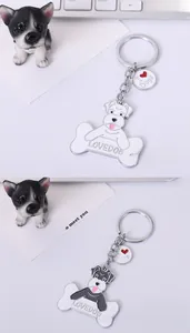 Détail de porte-clés chien Schnauzer en métal avec os Lovedog et pendentif I Love Dogs