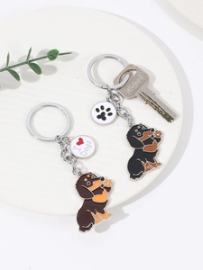 Dackel-Schlüsselanhänger mit I Love Dogs Anhänger und Pfotenabdruck an einem Metallring
