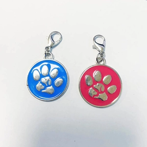 Customizable pet ID tags with colorful paw prints and cat dog silhouette engraving