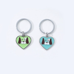 Minimalist heart-shaped cartoon dog keychain set in green and blue alloy drip oil finish