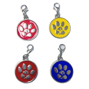 Four round zinc alloy pet tags with paw prints and silhouettes in pink, yellow, red, and blue