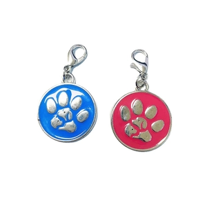 Blue and pink round dog tags with paw print silhouettes and lobster clasps