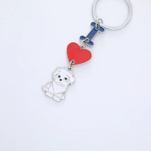 Macro detail of enamel I Love Dog keychain with heart and white puppy charm