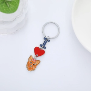 Detailed close-up of a Yorkshire Terrier keychain with I love heart charms in enamel alloy