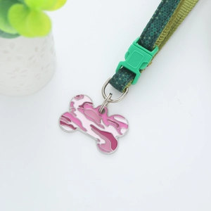 Pink camouflage bone shaped pet ID tag with matching green camo collar set