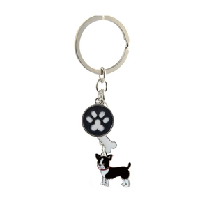 Detail of metal pet keychain featuring a Boston Terrier charm, paw print, and white bone