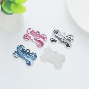 Colorful bone-shaped metal pet ID tags in camouflage enamel and polished silver finish