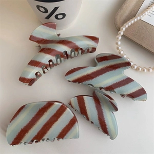 Vintage blue and brown checkered hair claw clips set in various shapes for women