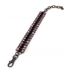 Close-up of pink crystal pet necklace with gun-black metal chain and lobster clasp